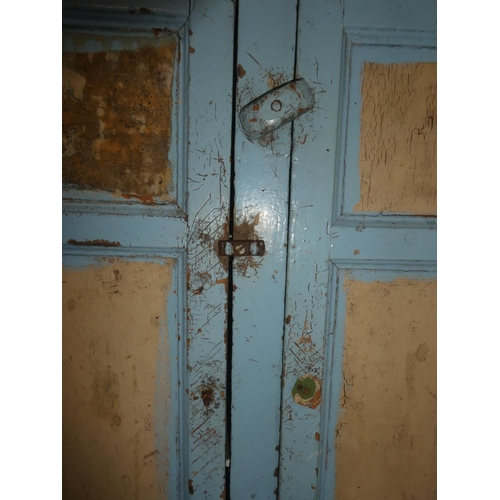 107 - A stunning antique Irish Vernacular panelled two door cupboard, measuring 109x151x28cm.