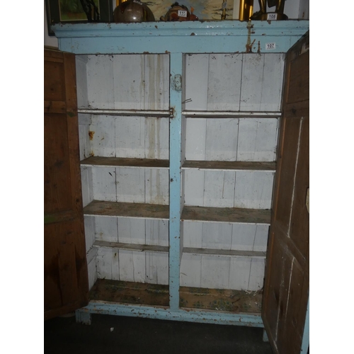 107 - A stunning antique Irish Vernacular panelled two door cupboard, measuring 109x151x28cm.