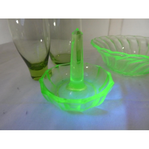 124 - An uranium glass ring holder and dish and two vintage glasses.