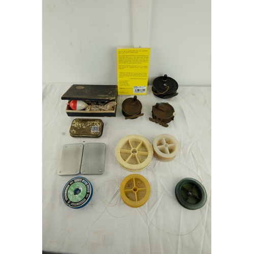 162 - A collection of vintage fishing line, a JW Young 'Condex' fishing reel, weights and more.