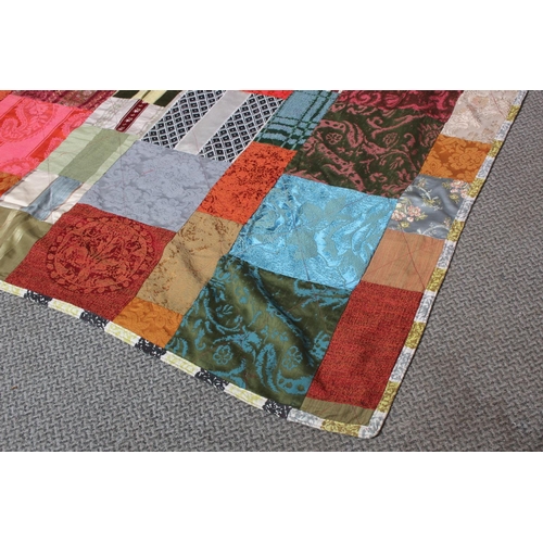 166 - A stunning vintage Irish handmade patchwork throw made from curtain material by quilter Kate McCarry... 