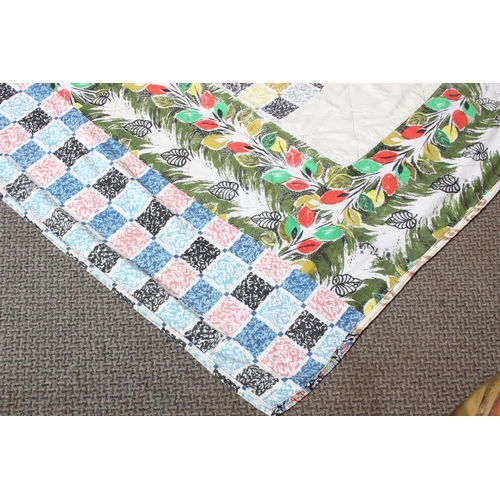 172 - A vintage Irish handmade throw made from curtain material by quilter Kate McCarry from Ballycastle, ... 