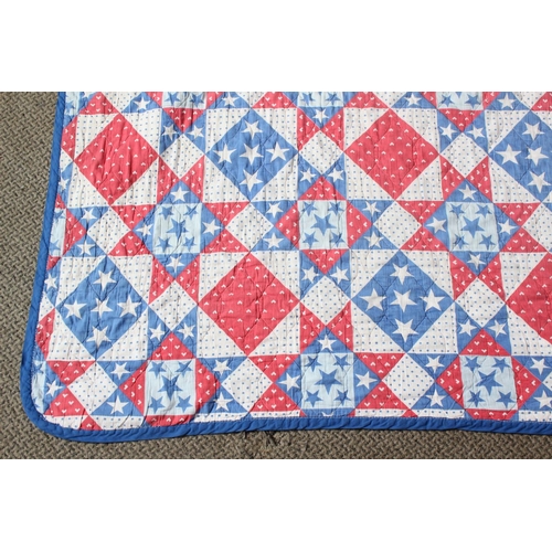 175 - A vintage American Amish handmade blanket, measuring 207cm x 140cm.