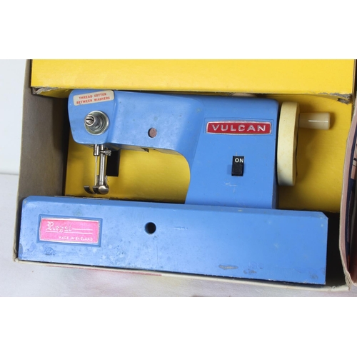 185 - A vintage boxed Vulcan Regal child's sewing machine.