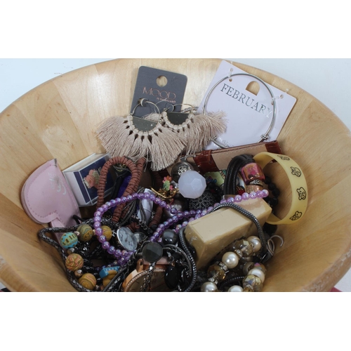 221 - A wooden fruit bowl and a lot of assorted costume jewellery.