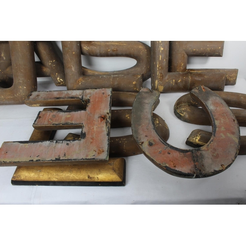 232 - A collection of vintage shop sign wooden letters, each measuring 30cm tall.  Letters
L x 3
C x 1
E x... 