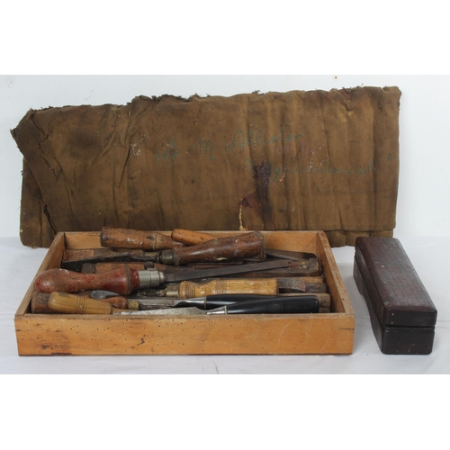 242 - A large lot of vintage drill bits in a tool roll, and a wooden tray of assorted chisels and a wooden... 