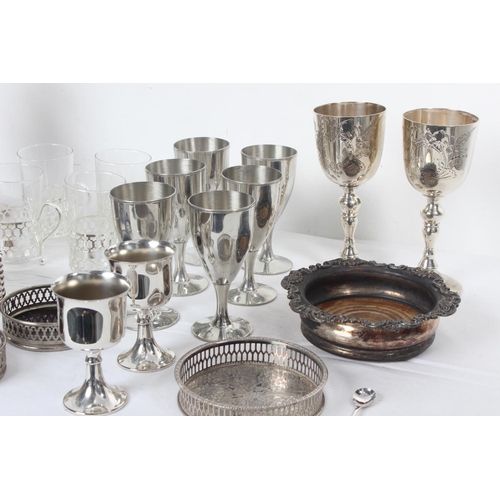 247 - An antique silver plated claret jug, wine coasters, a set of four French coffee glasses and more.