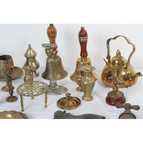 252 - A collection of brass ware including two letter box plates, bells, candlesticks and more.