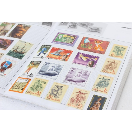 259 - Five World Stamp Albums and stamps.