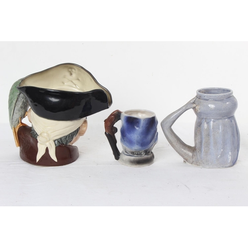 260 - A Royal Doulton 'Long John Silver' mask jug D6335 and two others.