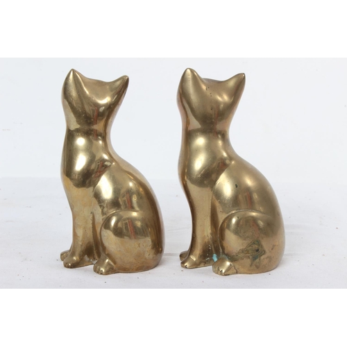 265 - Two vintage heavy brass cats.