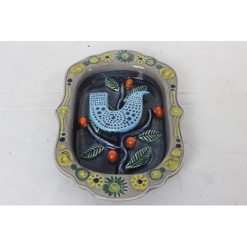 A vibrant colourful Arklow Pottery Studios, Co Wicklow ceramic wall plaque by Irish designer John Ffrench 'Partridge in a Pear Tree'.
