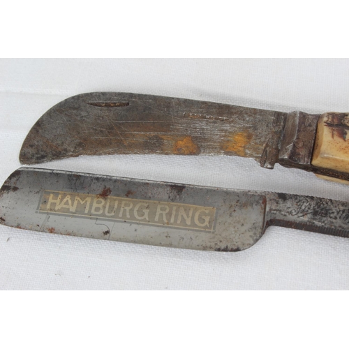 283 - An antique horn handled knife & cut-throat razor.