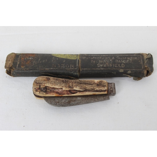 283 - An antique horn handled knife & cut-throat razor.