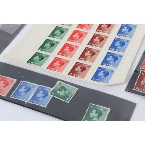 296 - A lot of King George and King Edward postage stamps and overprints used and unused.