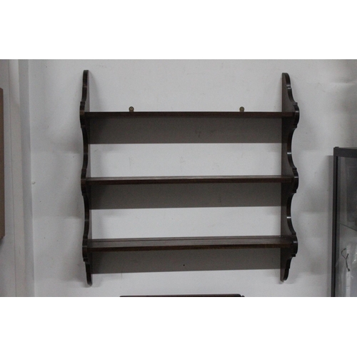 310 - A 3 tier shelving unit.