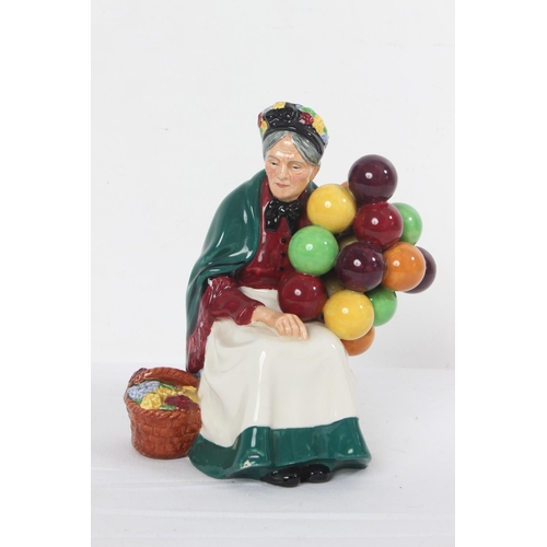 313 - A Royal Doulton figure, 'The Old Balloon Seller', HN1315