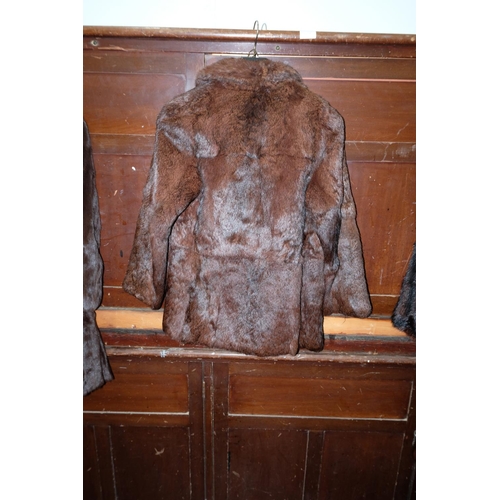 323 - An antique fur coat.