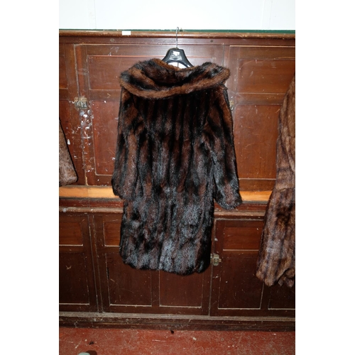 324 - An antique fur coat, by Siberian Fur Co Ltd Belfast.