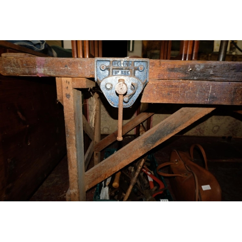 343 - A vintage carpenters work bench with vice.