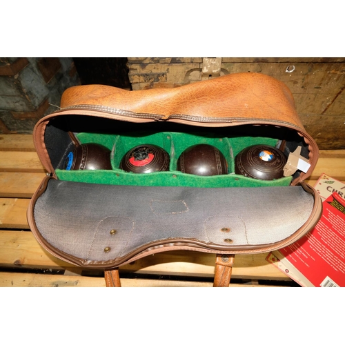 345 - A set of Boules in leather bag.