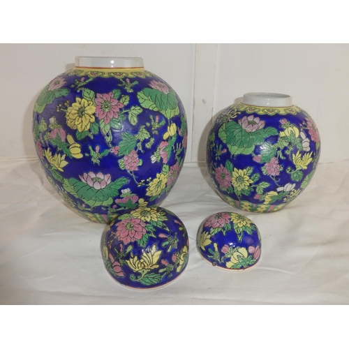 434 - A set of vintage large ceramic Ginger jars with decorative designs.