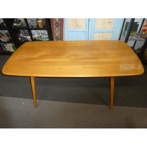 450 - A stunning Mid Century Ercol 'Blonde' plank top dining table.