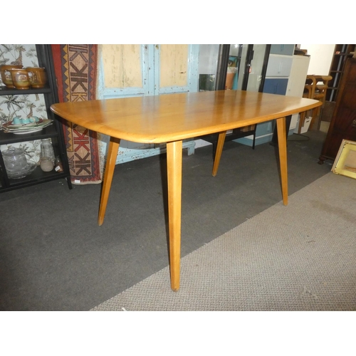 450 - A stunning Mid Century Ercol 'Blonde' plank top dining table.