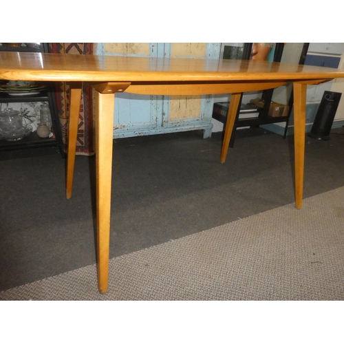 450 - A stunning Mid Century Ercol 'Blonde' plank top dining table.