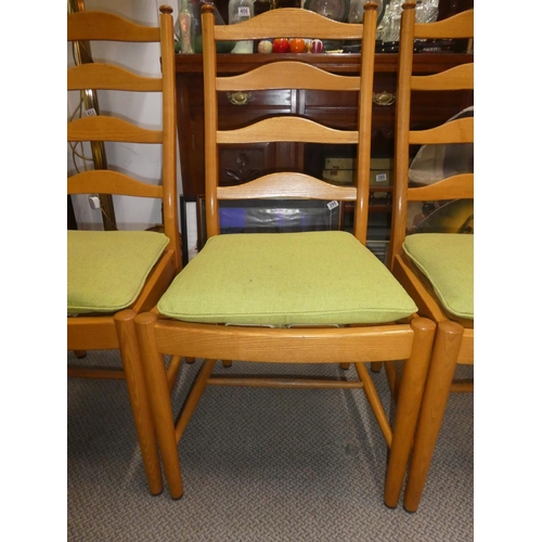 451 - A set of 4 Mid Century Ercol ladder back dining chairs.