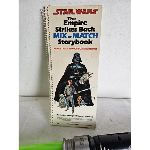 397 - An extendable Star Wars Lightsaber and an original Star Wars 1980 The Empire Strikes Back Mix or Mat... 