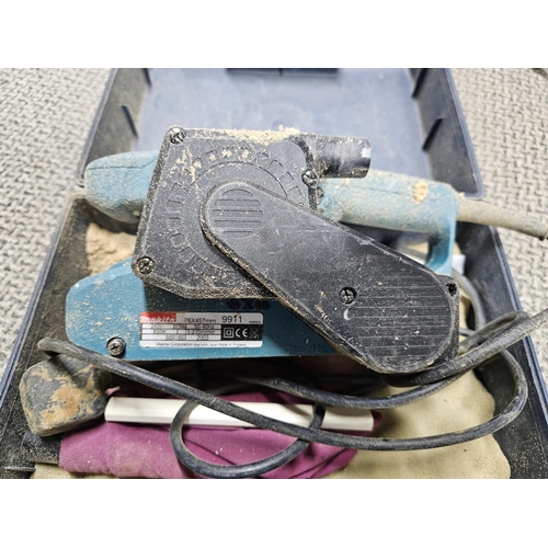 479 - A Makita sander in case.