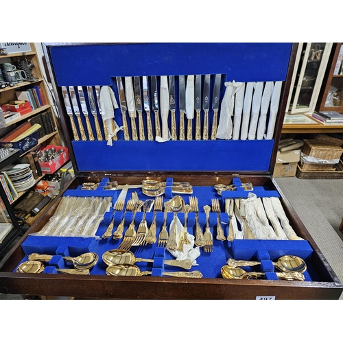 497 - A stunning canteen of gold plated Kings pattern cutlery, in coffee table canteen.