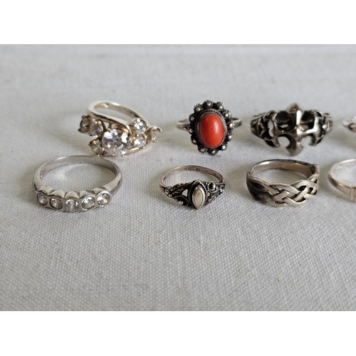 372 - A collection of 10 silver dress rings.