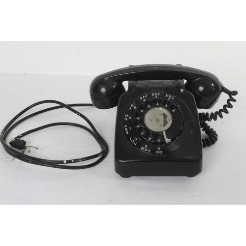 167 - A vintage rotary dial telephone.