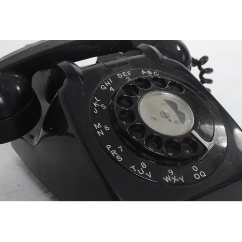 167 - A vintage rotary dial telephone.