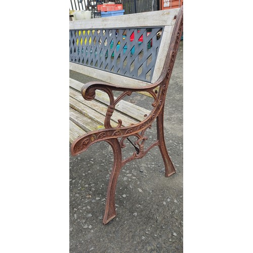 59 - A garden bench with cast iron ends & back ( for restoration)