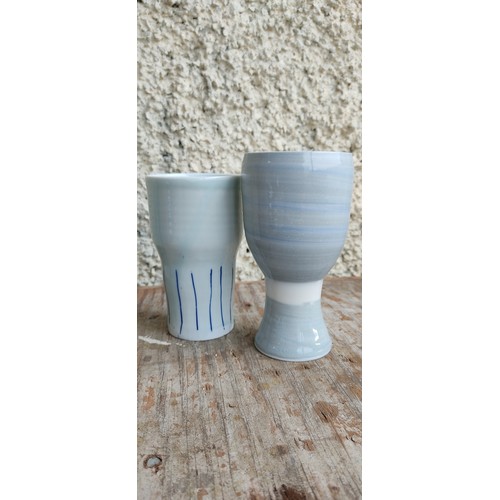 118 - A studio pottery wine goblet and a cup by artist Adam Frew.