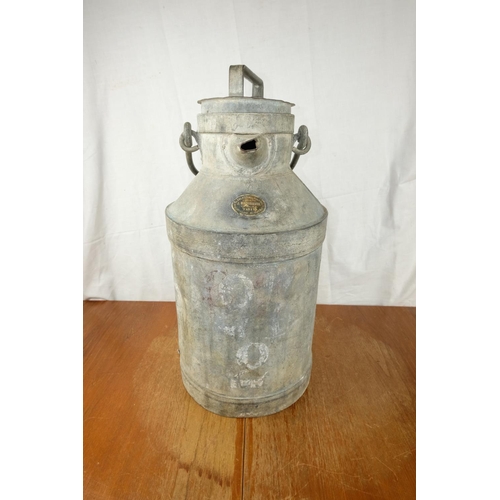 104 - A vintage metal cannister produced by J Maisonneuve, Paris, measuring 22