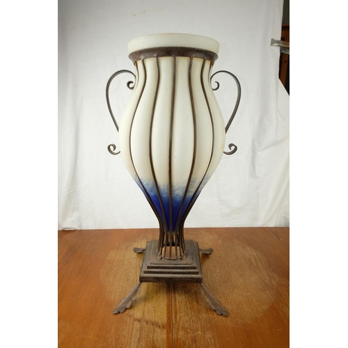 106 - A stunning large glass vase centre piece encased in a metal stand, measuring 26