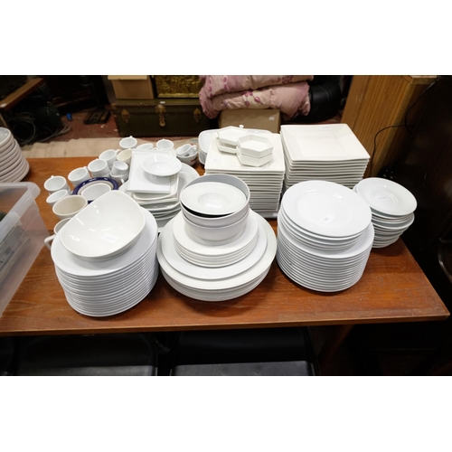 117 - A large lot of catering plates, coffee cups, dishes and more.