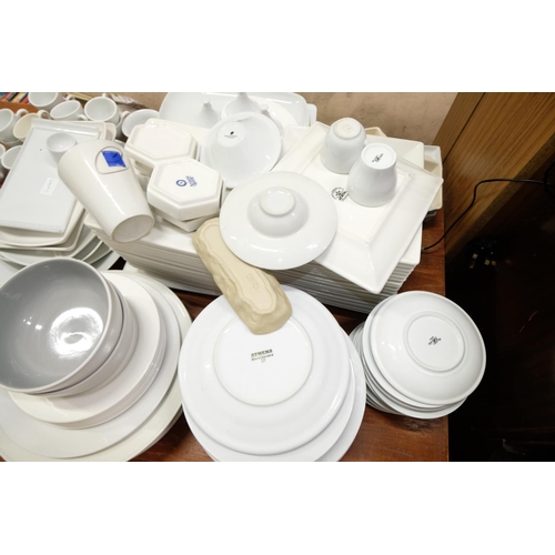 117 - A large lot of catering plates, coffee cups, dishes and more.