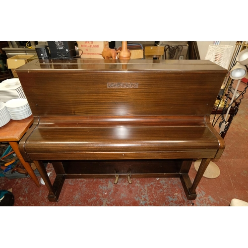 136 - A vintage Crane & Son mahogany cased piano. 114x135x56cm