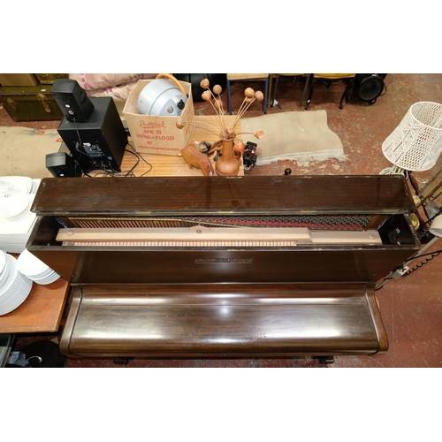 136 - A vintage Crane & Son mahogany cased piano. 114x135x56cm