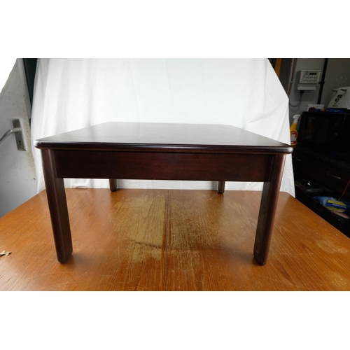 138 - A Parker Knoll coffee table  33x59x59cm