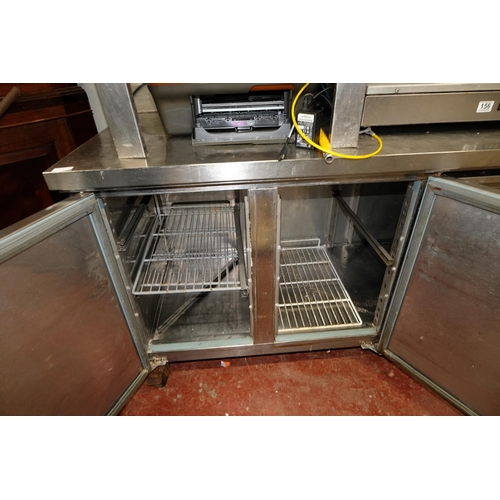 150 - A commercial Rhino stainless steel 3 door counter chill cabinet. (untested)