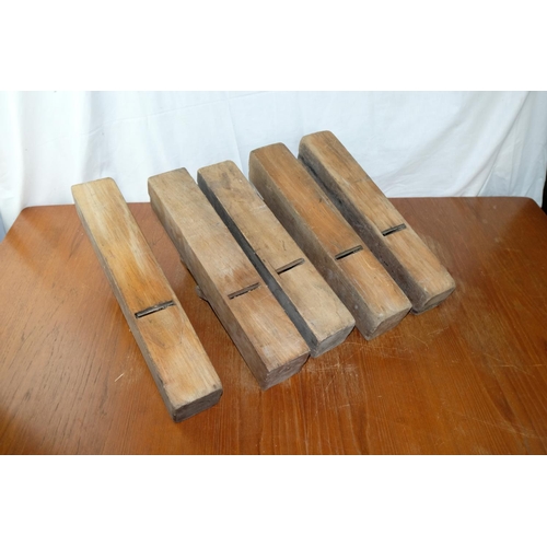 62 - Five large antique wooden jack planes, measuring 17