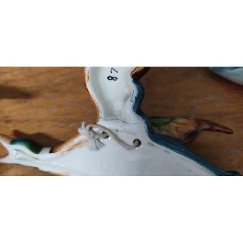 67 - A set of three vintage Beswick flying ducks. (old repairs)