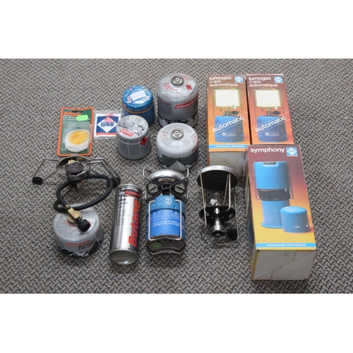 512 - A large assortment of gas canisters and more.